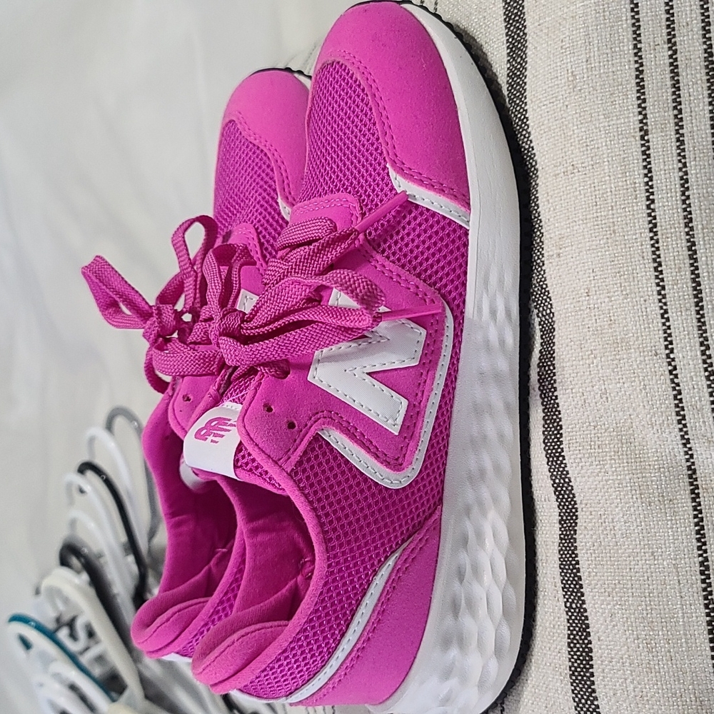 Pink new balance shoes